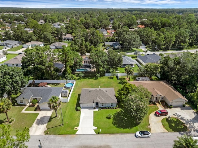 69 Pin Oak Dr, Palm Coast, FL 32164 - aerial view of residential area featuring a heavily wooded area