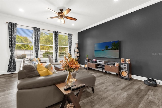 1608 Mohegan Blvd, Kissimmee, FL 34744 - living room featuring crown molding, ceiling fan, wood finished floors, and recessed lighting