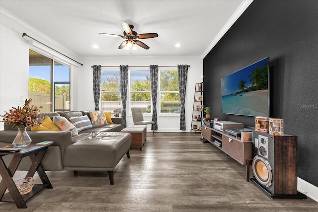 1608 Mohegan Blvd, Kissimmee, FL 34744 - living room featuring crown molding, a ceiling fan, healthy amount of natural light, wood finished floors, and recessed lighting