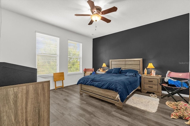 1608 Mohegan Blvd, Kissimmee, FL 34744 - bedroom with wood finished floors and ceiling fan