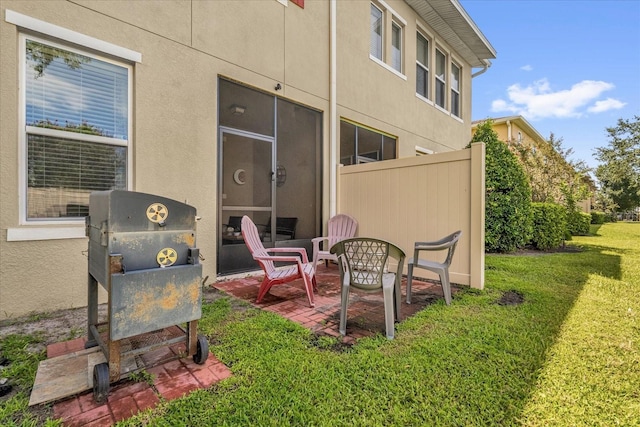 1608 Mohegan Blvd, Kissimmee, FL 34744 - view of green lawn featuring a patio area
