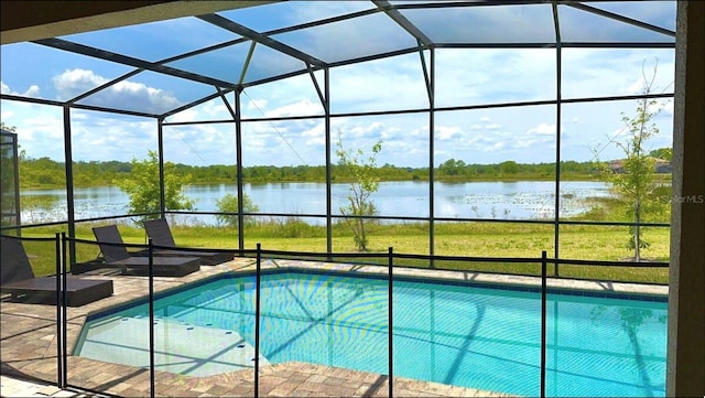 197 Macaulays Cv, Haines City, FL 33844 - outdoor pool featuring a water view and glass enclosure