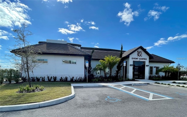 197 Macaulays Cv, Haines City, FL 33844 - view of building exterior with uncovered parking