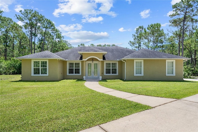 859 Leather Fern Ln, Mims, FL 32754 - single story home with french doors, stucco siding, and a front yard