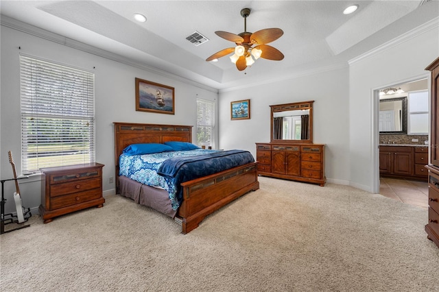 859 Leather Fern Ln, Mims, FL 32754 - bedroom featuring a raised ceiling, light colored carpet, crown molding, recessed lighting, and connected bathroom