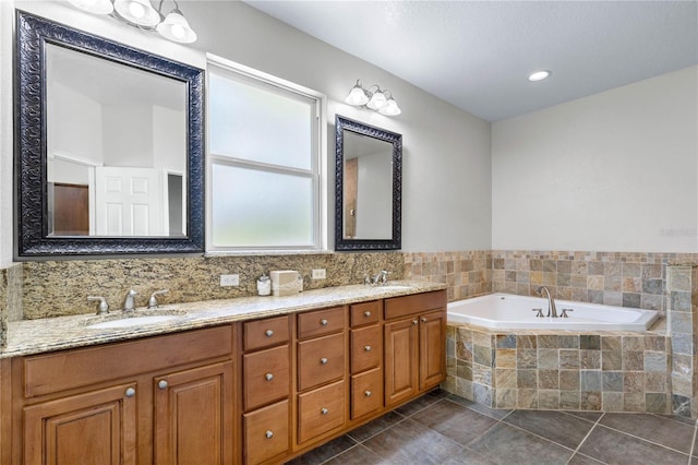 859 Leather Fern Ln, Mims, FL 32754 - bathroom featuring double vanity, a garden tub, and tile patterned floors