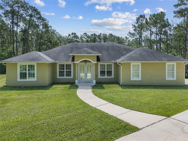 859 Leather Fern Ln, Mims, FL 32754 - ranch-style house featuring french doors, stucco siding, and a front yard