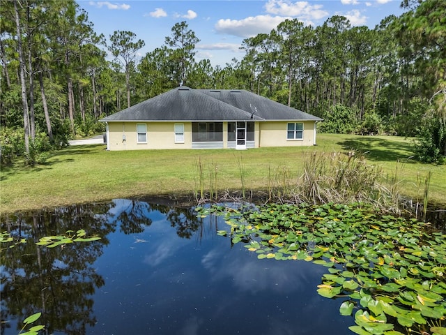 859 Leather Fern Ln, Mims, FL 32754 - back of property with a yard and stucco siding