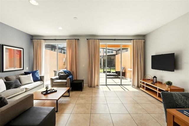 2617 Bugatti Ct, Kissimmee, FL 34746 - living area featuring plenty of natural light, light tile patterned floors, and recessed lighting
