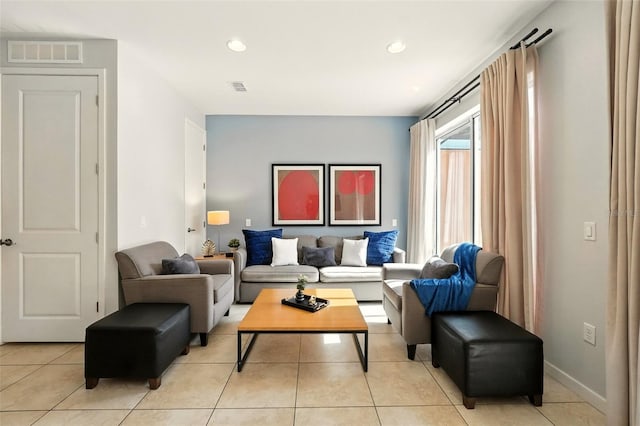 2617 Bugatti Ct, Kissimmee, FL 34746 - living area featuring light tile patterned floors and recessed lighting