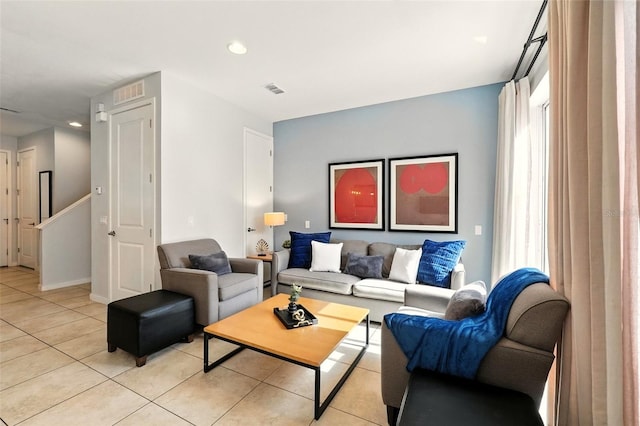 2617 Bugatti Ct, Kissimmee, FL 34746 - living area with light tile patterned floors and recessed lighting