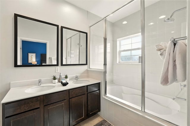 2617 Bugatti Ct, Kissimmee, FL 34746 - bathroom with tiled shower / bath and double vanity