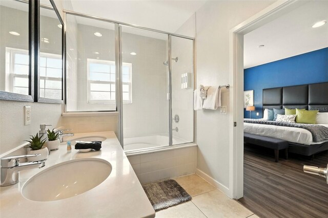 2617 Bugatti Ct, Kissimmee, FL 34746 - ensuite bathroom featuring tiled shower / bath, tile patterned floors, and double vanity