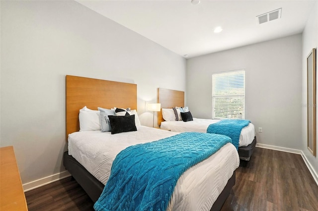 2617 Bugatti Ct, Kissimmee, FL 34746 - bedroom featuring wood finished floors and baseboards