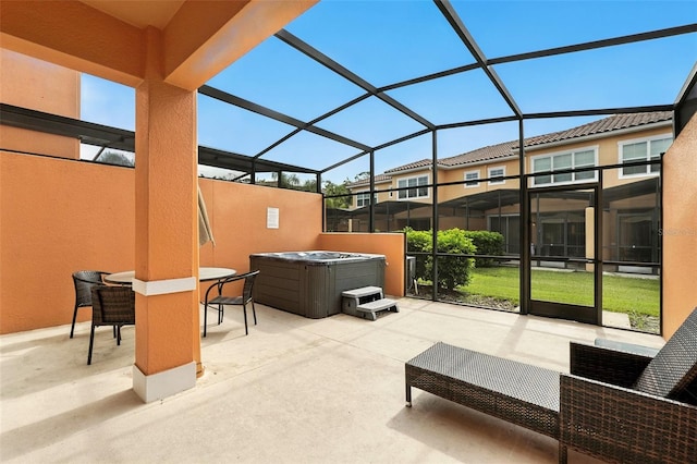 2617 Bugatti Ct, Kissimmee, FL 34746 - view of patio / terrace featuring a hot tub and a lanai