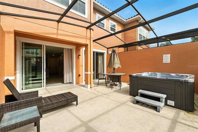 2617 Bugatti Ct, Kissimmee, FL 34746 - view of patio with a hot tub and outdoor dining area