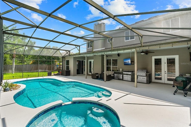 4323 Kezar Ct, Belle Isle, FL 32812 - view of pool with french doors, a ceiling fan, a pool with connected hot tub, a patio area, and an outdoor kitchen