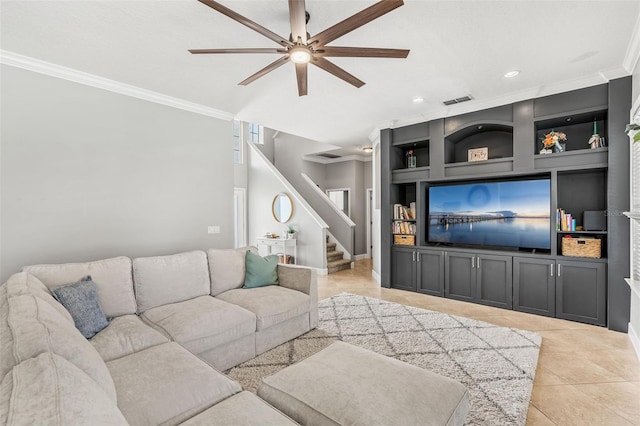 4323 Kezar Ct, Belle Isle, FL 32812 - living room with ceiling fan, ornamental molding, light tile patterned floors, stairs, and built in features