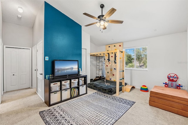 4323 Kezar Ct, Belle Isle, FL 32812 - rec room with carpet floors, lofted ceiling, and a ceiling fan