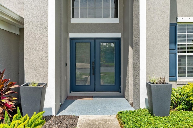 4323 Kezar Ct, Belle Isle, FL 32812 - doorway to property with stucco siding