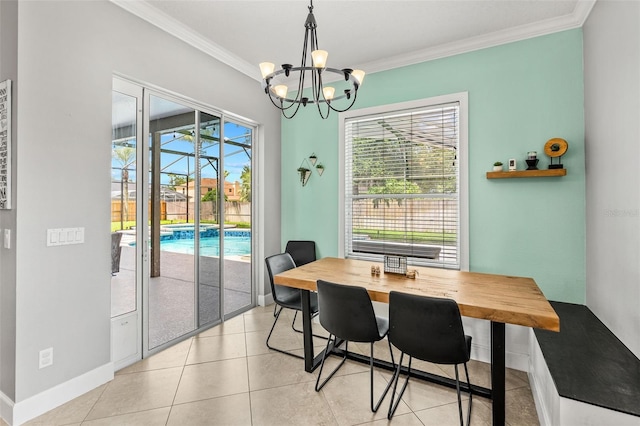 4323 Kezar Ct, Belle Isle, FL 32812 - dining space featuring a chandelier, crown molding, and light tile patterned floors