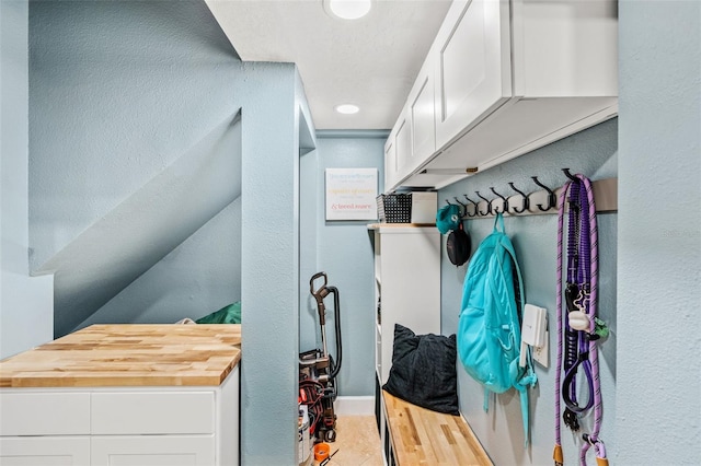 4323 Kezar Ct, Belle Isle, FL 32812 - mudroom with a textured wall and recessed lighting