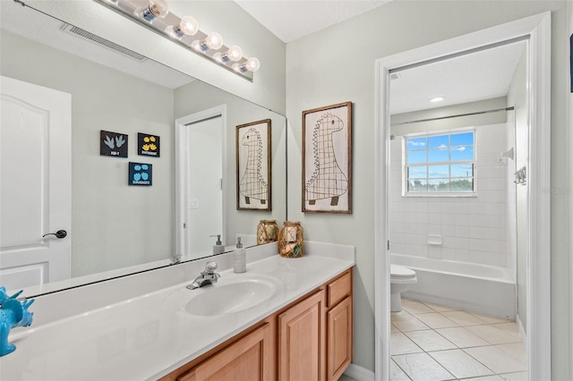 4323 Kezar Ct, Belle Isle, FL 32812 - bathroom featuring vanity, tile patterned floors, and washtub / shower combination