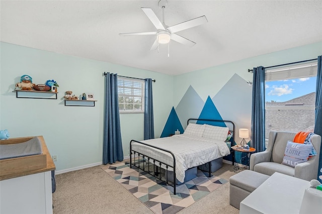 4323 Kezar Ct, Belle Isle, FL 32812 - bedroom featuring light colored carpet and a ceiling fan