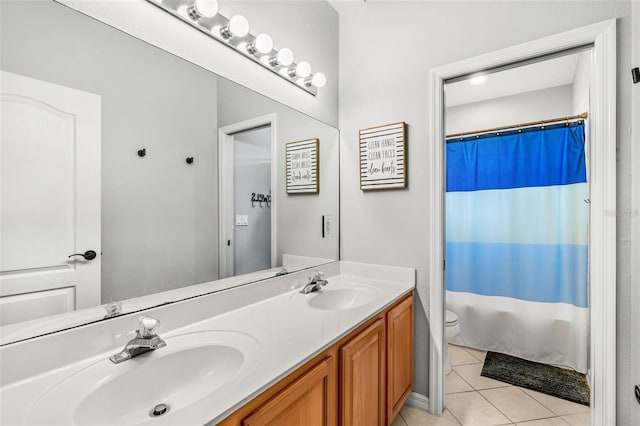 4323 Kezar Ct, Belle Isle, FL 32812 - bathroom featuring tile patterned floors, double vanity, and a shower with shower curtain