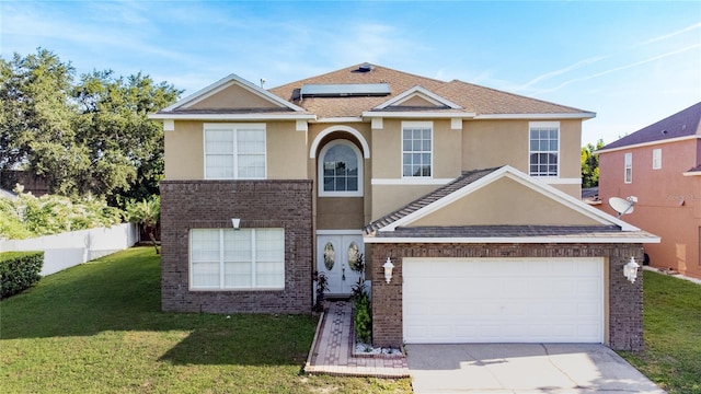 229 Largovista Dr, Oakland, FL 34787 - traditional home with concrete driveway, stucco siding, roof mounted solar panels, brick siding, and an attached garage