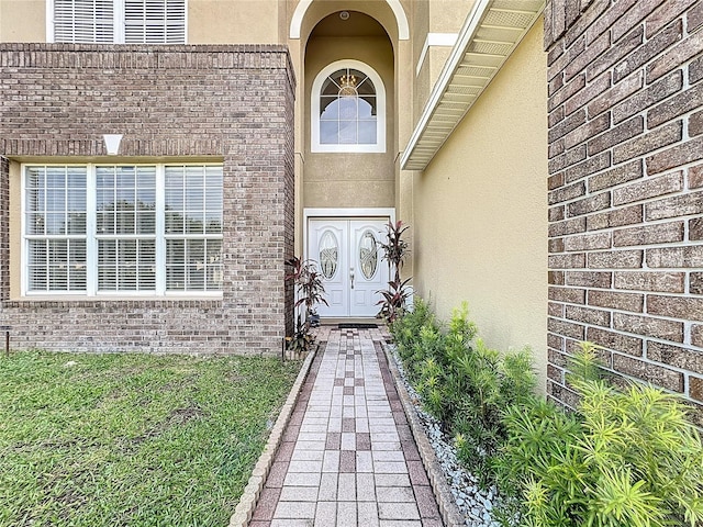 229 Largovista Dr, Oakland, FL 34787 - property entrance with stucco siding and brick siding