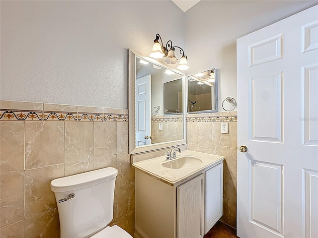229 Largovista Dr, Oakland, FL 34787 - half bath featuring tile walls, vanity, and wainscoting