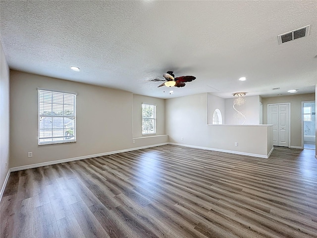 229 Largovista Dr, Oakland, FL 34787 - unfurnished room with wood finished floors, plenty of natural light, a textured ceiling, recessed lighting, and a ceiling fan