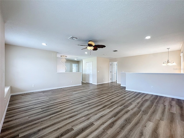 229 Largovista Dr, Oakland, FL 34787 - unfurnished living room with wood finished floors, recessed lighting, a ceiling fan, a chandelier, and a textured ceiling