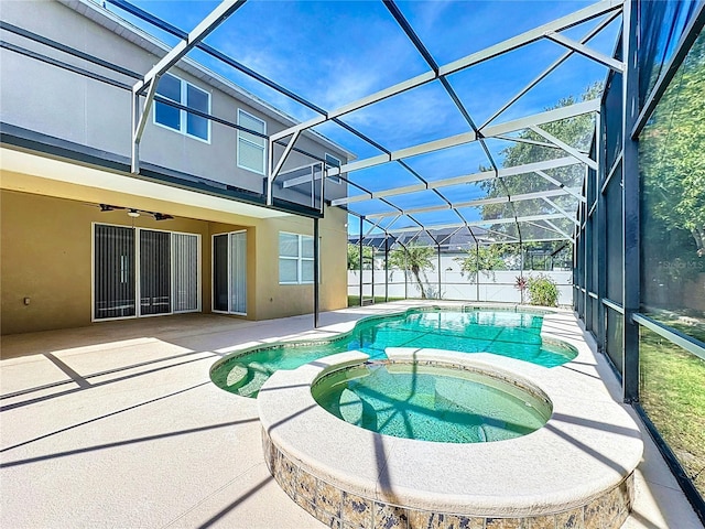 229 Largovista Dr, Oakland, FL 34787 - view of swimming pool with a pool with connected hot tub, a patio area, glass enclosure, and a ceiling fan