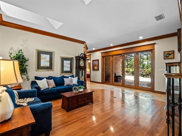 9045 Mossy Oak Ln, Clermont, FL 34711 - living room with crown molding, a skylight, light wood-style floors, and recessed lighting