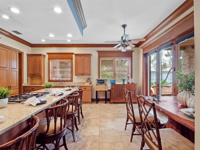 9045 Mossy Oak Ln, Clermont, FL 34711 - dining area featuring ornamental molding, recessed lighting, ceiling fan, and light tile patterned flooring