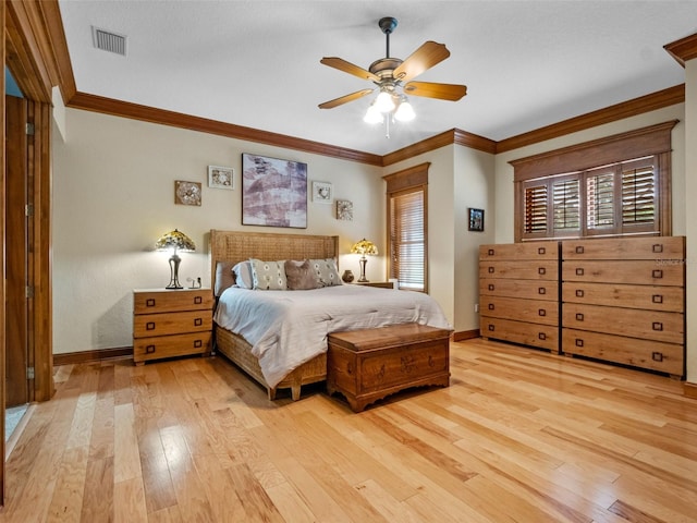 9045 Mossy Oak Ln, Clermont, FL 34711 - bedroom with light wood-type flooring, ornamental molding, and a ceiling fan