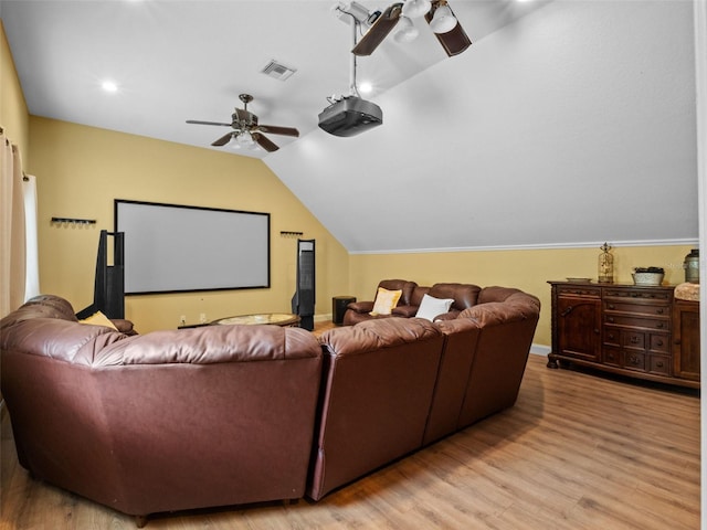 9045 Mossy Oak Ln, Clermont, FL 34711 - cinema with ceiling fan, light wood-style floors, and vaulted ceiling