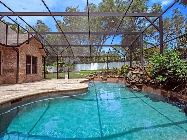 9045 Mossy Oak Ln, Clermont, FL 34711 - view of pool featuring a patio area and glass enclosure
