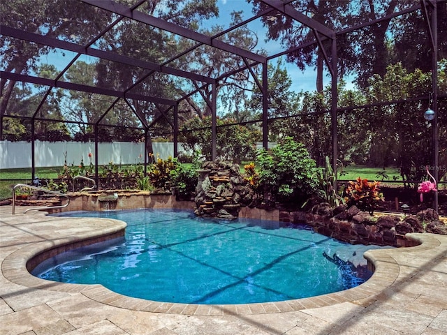 9045 Mossy Oak Ln, Clermont, FL 34711 - view of swimming pool with glass enclosure and a patio