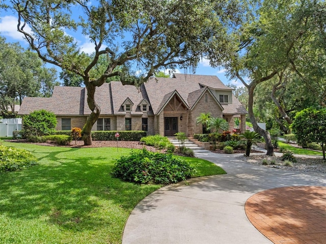 9045 Mossy Oak Ln, Clermont, FL 34711 - tudor home with brick siding