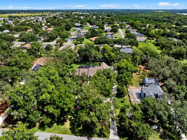 9045 Mossy Oak Ln, Clermont, FL 34711 - aerial perspective of suburban area