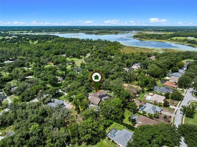 9045 Mossy Oak Ln, Clermont, FL 34711 - aerial view of property's location with a large body of water and a heavily wooded area