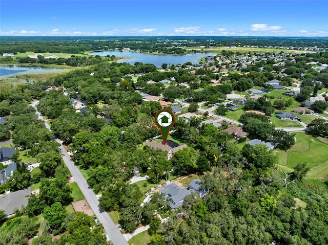 9045 Mossy Oak Ln, Clermont, FL 34711 - aerial view of property and surrounding area with a nearby body of water and nearby suburban area