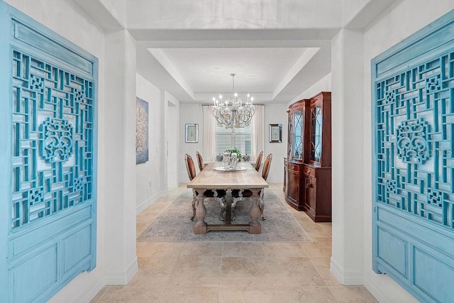 14897 Ellingsworth Ln, Winter Garden, FL 34787 - dining area with a chandelier and a raised ceiling