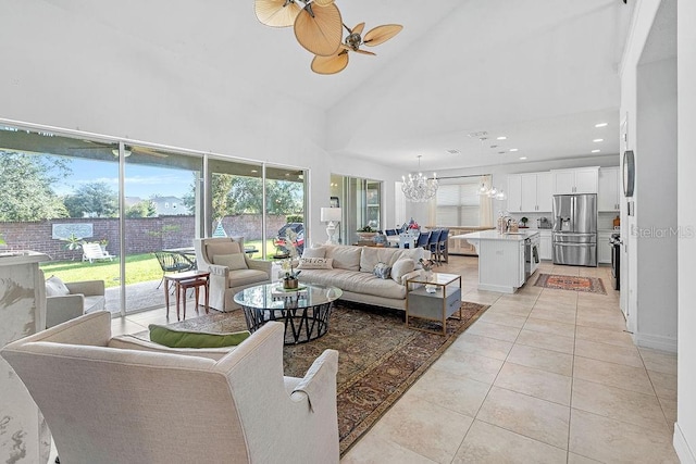 14897 Ellingsworth Ln, Winter Garden, FL 34787 - living area featuring a chandelier, light tile patterned floors, high vaulted ceiling, a ceiling fan, and recessed lighting