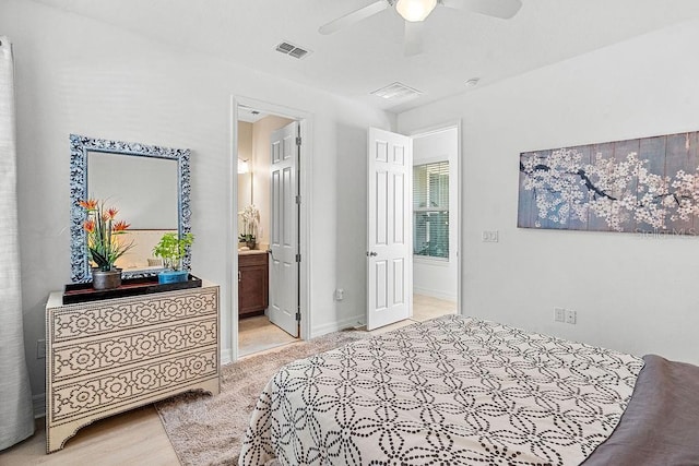 14897 Ellingsworth Ln, Winter Garden, FL 34787 - bedroom with ensuite bathroom and a ceiling fan