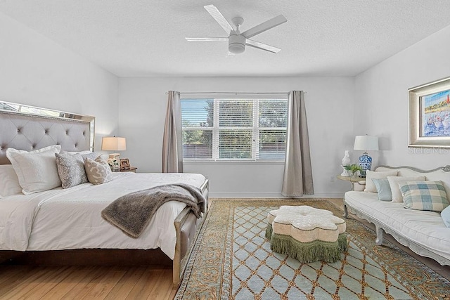 14897 Ellingsworth Ln, Winter Garden, FL 34787 - bedroom featuring a textured ceiling and a ceiling fan