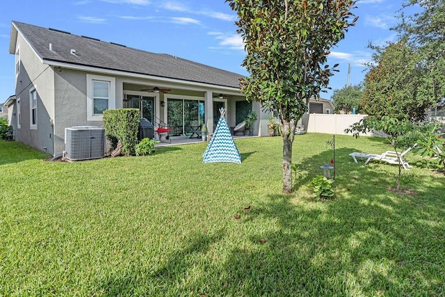 14897 Ellingsworth Ln, Winter Garden, FL 34787 - view of front of house featuring ceiling fan, stucco siding, a patio area, and a shingled roof